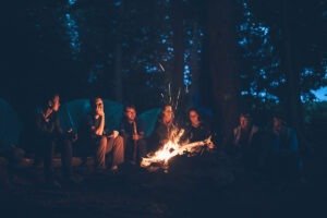 people around a campfire