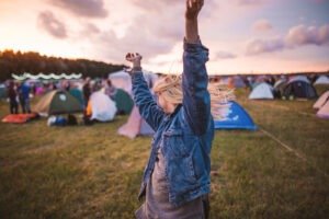 young girl dancing at a glampsite