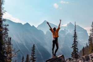 woman on mountaintop in canada